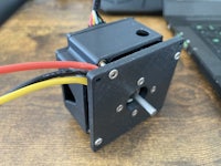 a small motor attached to a laptop